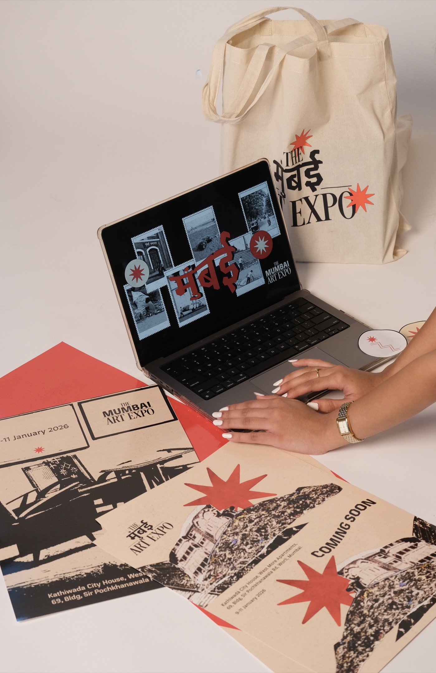 The Mumbai Art Expo identity system — tote bag, stamp collage, event posters, and stickers